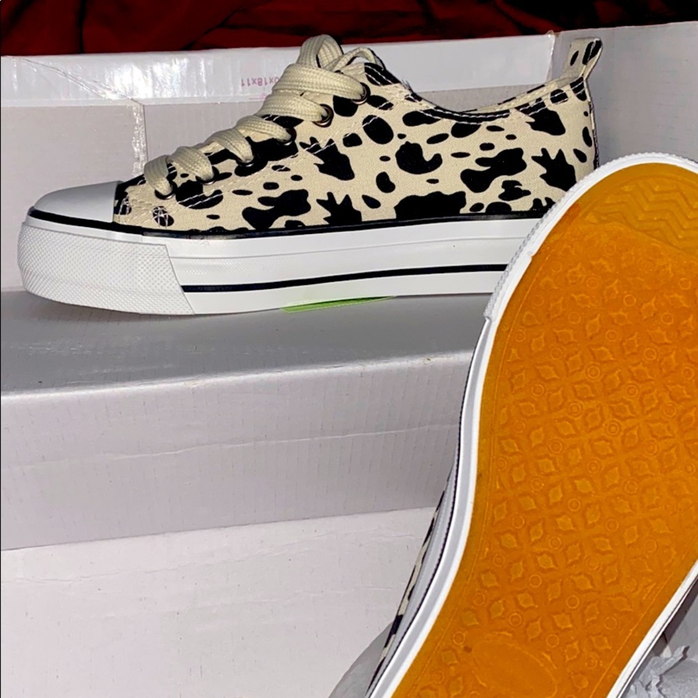 Olivia Miller (cow print chucks)